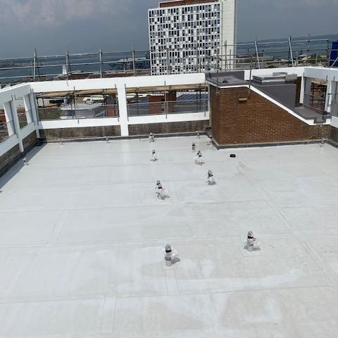 Sarnafil light grey single ply membrane roof Portsmouth’s historic Hard
